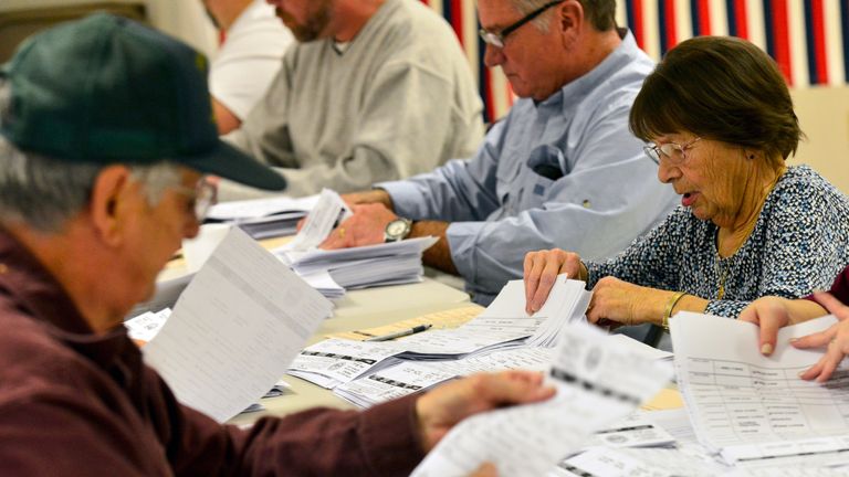 People hand-counting votes in the 2016 US election. Pic: AP