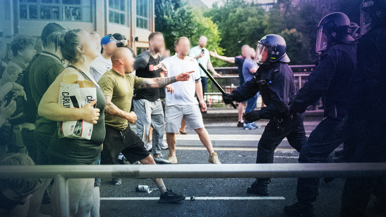 Protesters face police during a riot on 3 Aug that took place in Bristol after the Southport incident. Pic: AP