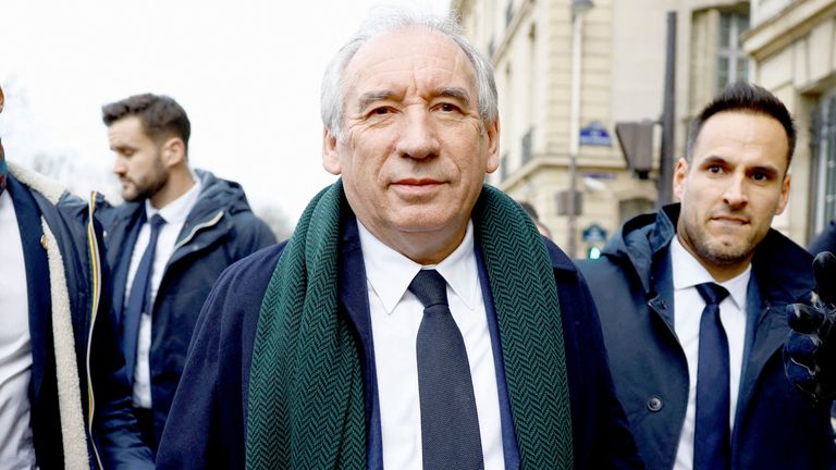 Newly appointed Prime Minister Francois Bayrou walks   leaves the offices of the high commissioner for planning in Paris.
Pic: Reuters