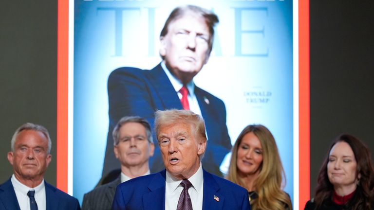 Donald Trump speaks during a Time magazine Person of the Year event at the New York Stock Exchange.
Pic: AP