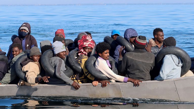 Migrants are spotted by Tunisian coast guards at sea during their attempt to cross to Italy last year. File Pic: Reuters
