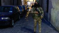 A rebel fighter stands guard in Damascus old city. Pic: Reuters/Ammar Awad