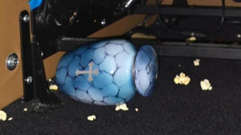 Urn containing ashes is discovered under a seat in a Wisconsin cinema