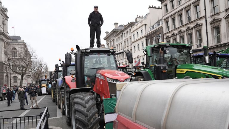 Tractors parked on Whitehall during a protest by farmers in Westminster.
Pic: Re